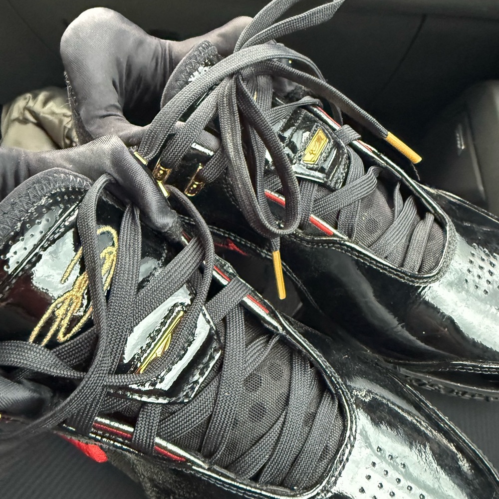 Nike Black and Gold Sneakers